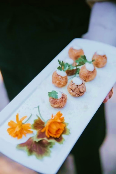 Passed hors d'oeuvres with edible flowers