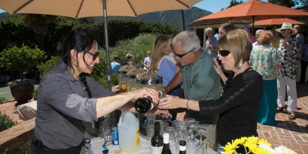 Outdoor wine service at a garden event